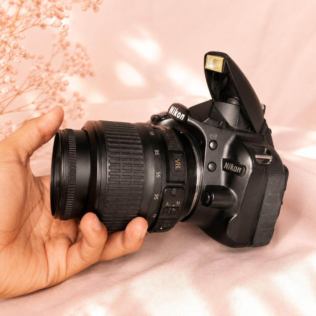 Nikon D3100 — angled side view